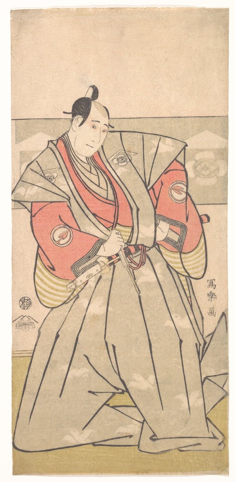曽我十郎祐成を勤める三代目澤村宗十郎。灰の裃に紅の小袖、刀の柄に手を掛けて立つ全身像