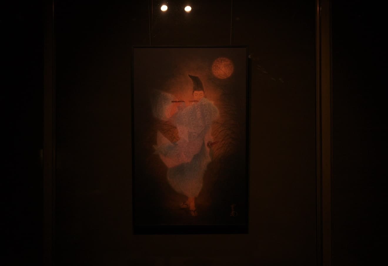 A painting of a flute player under the moon, at the exhibition