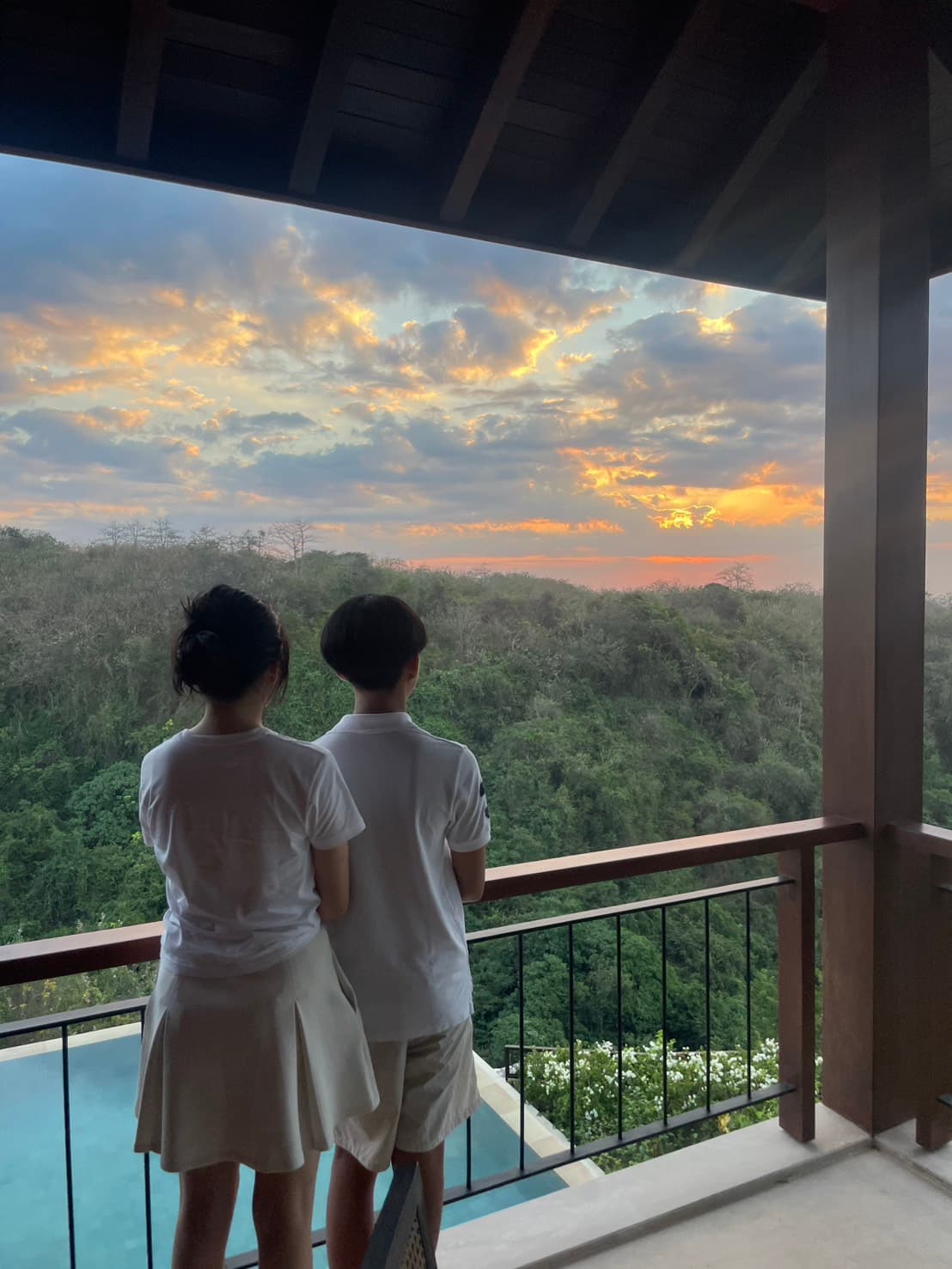 On the balcony at dusk